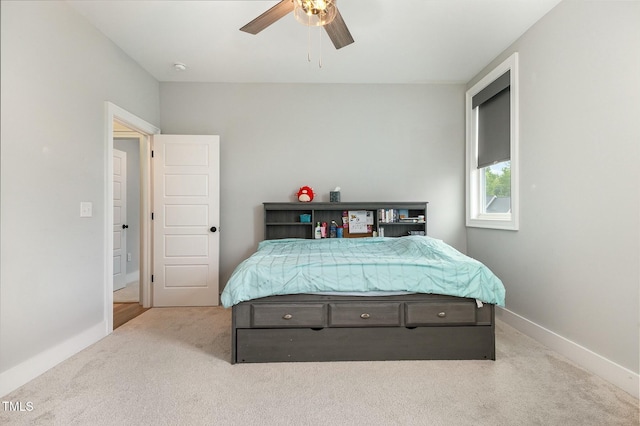 bedroom featuring baseboards, carpet floors, and ceiling fan