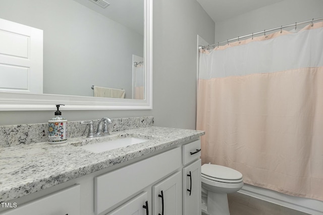 full bath with visible vents, toilet, and vanity