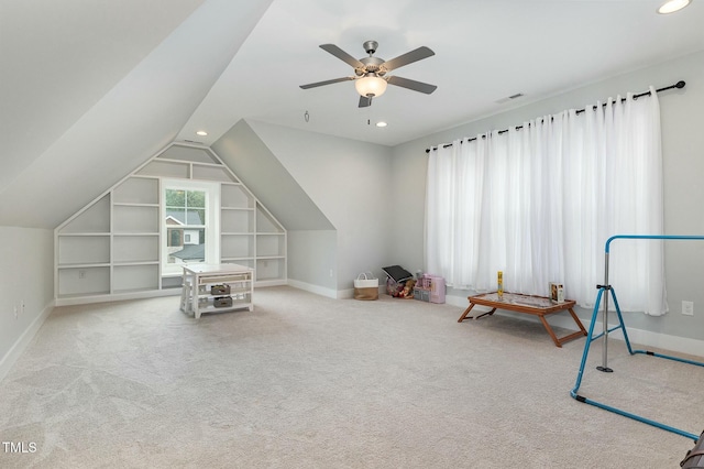 playroom with built in shelves, baseboards, lofted ceiling, recessed lighting, and carpet flooring