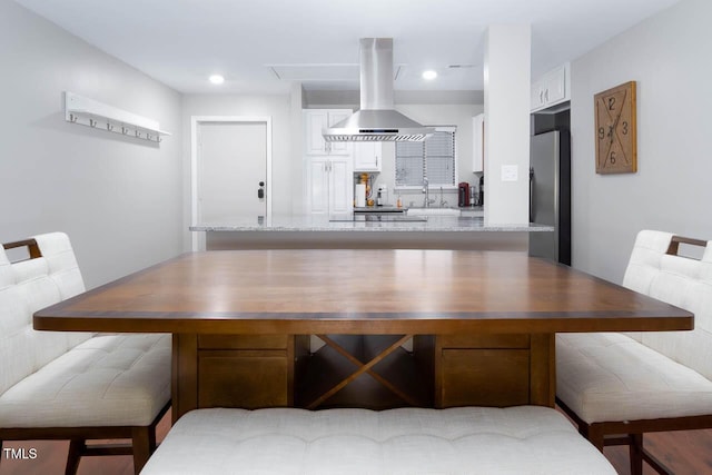 dining area with recessed lighting