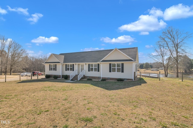 ranch-style home featuring crawl space, a front yard, and fence