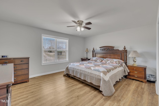 bedroom featuring light wood-style floors, baseboards, and ceiling fan