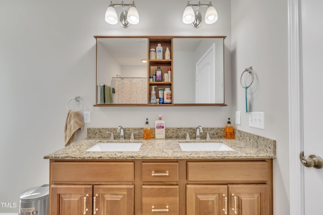 full bathroom featuring a sink, curtained shower, and double vanity