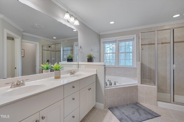 bathroom with crown molding, double vanity, a stall shower, tile patterned floors, and a sink