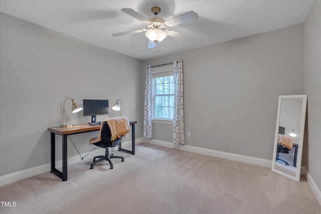 office area featuring baseboards, carpet, and a ceiling fan