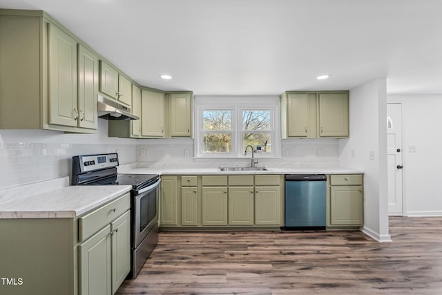 kitchen with green cabinets, dishwashing machine, stainless steel electric range oven, and a sink