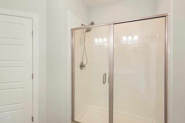 bathroom featuring a stall shower