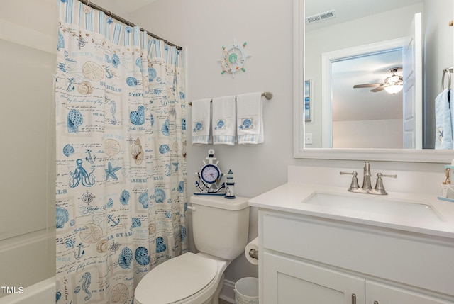 bathroom with vanity, toilet, visible vents, and ceiling fan