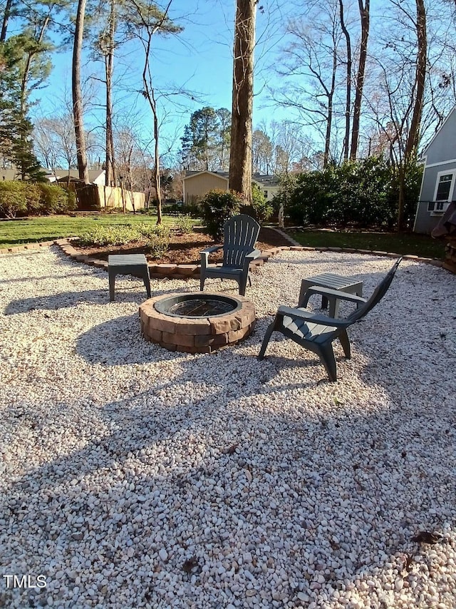 view of yard featuring a fire pit