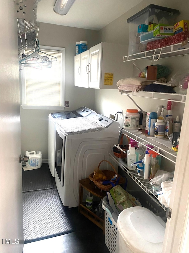 laundry area with cabinet space and washing machine and dryer