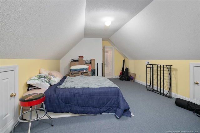 bedroom featuring baseboards, a textured ceiling, carpet flooring, and vaulted ceiling