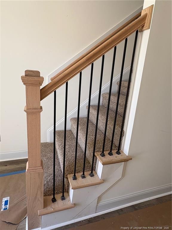 stairway with baseboards
