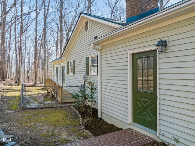 view of home's exterior with a chimney