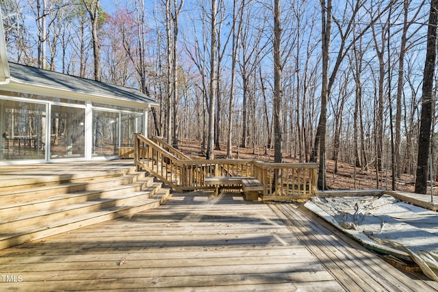 deck featuring a sunroom