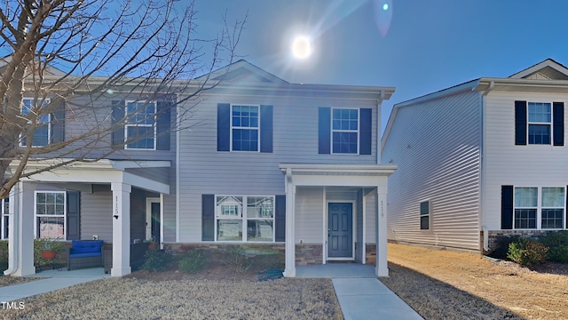 view of front of home with stone siding