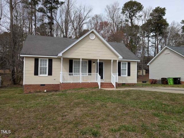 view of front of home featuring crawl space, roof with shingles, covered porch, and a front lawn