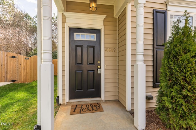 property entrance featuring fence