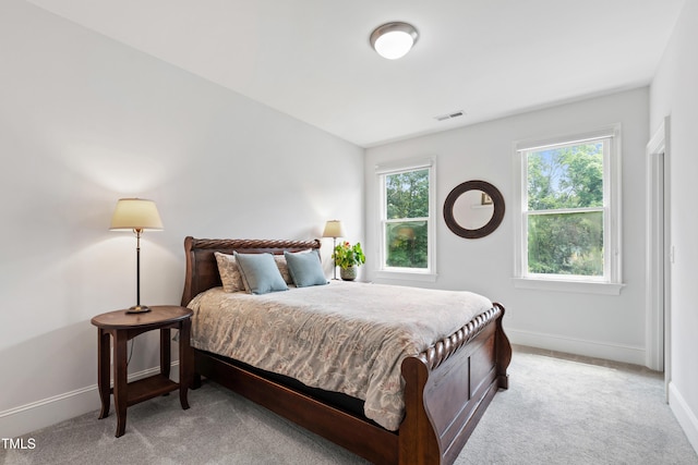 3337 Cheswick Dr, Raleigh, NC 27609 - bedroom featuring light carpet and baseboards