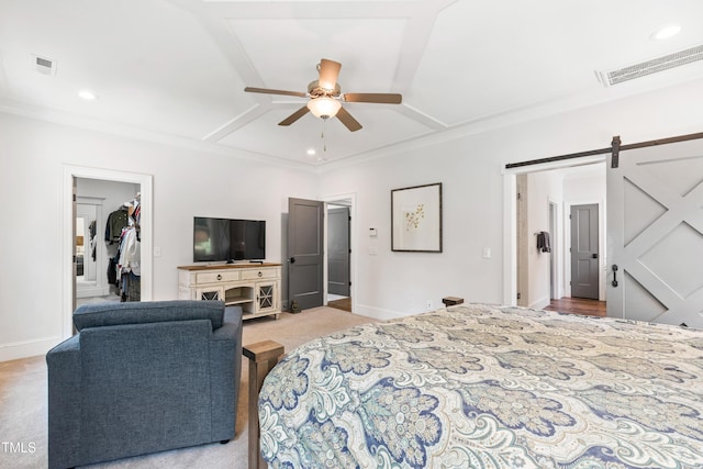 3337 Cheswick Dr, Raleigh, NC 27609 - bedroom with a spacious closet, a barn door, a ceiling fan, carpet, and ornamental molding