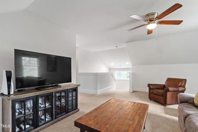3337 Cheswick Dr, Raleigh, NC 27609 - carpeted living area with vaulted ceiling and a ceiling fan