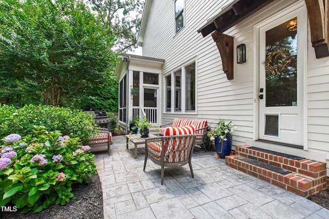 3337 Cheswick Dr, Raleigh, NC 27609 - view of patio featuring outdoor lounge area, area for grilling, and a sunroom