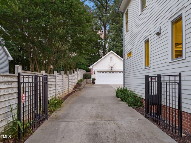 3337 Cheswick Dr, Raleigh, NC 27609 - view of home's exterior with an outbuilding and a garage