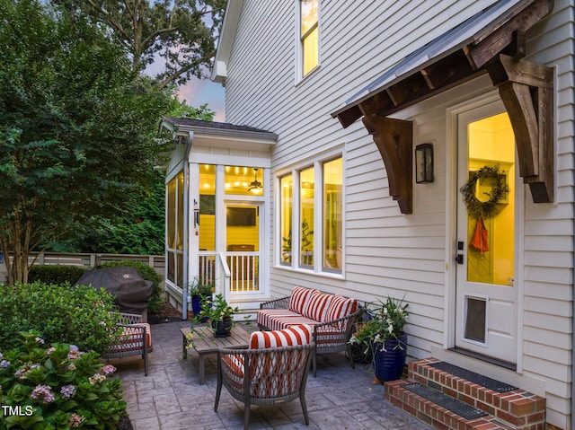 3337 Cheswick Dr, Raleigh, NC 27609 - patio terrace at dusk with entry steps, a patio area, outdoor lounge area, and a grill