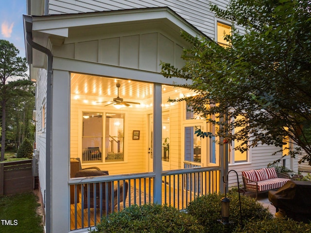 3337 Cheswick Dr, Raleigh, NC 27609 - rear view of house featuring ceiling fan and board and batten siding