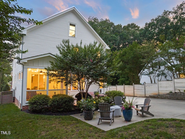 3337 Cheswick Dr, Raleigh, NC 27609 - rear view of property featuring a patio area and board and batten siding