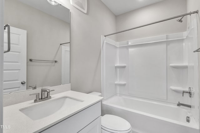 bathroom with visible vents, vanity, toilet, and  shower combination