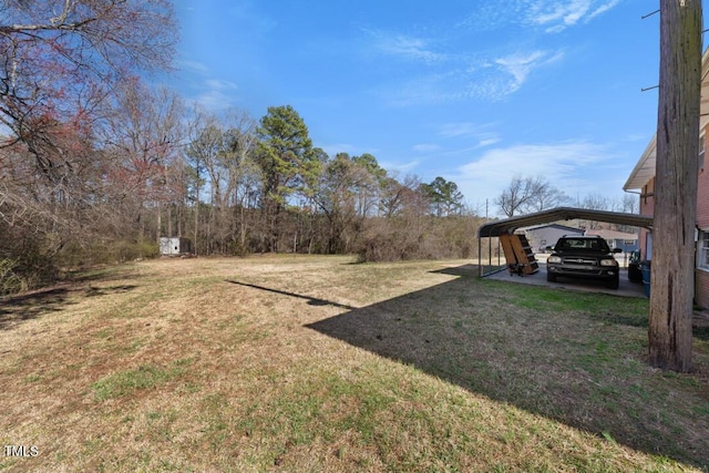 view of yard with a detached carport