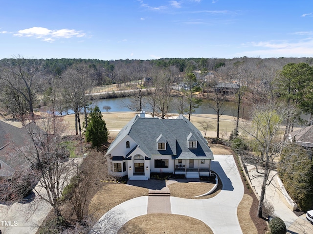 bird's eye view with a water view