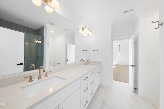 bathroom with visible vents, ornamental molding, a stall shower, marble finish floor, and a sink