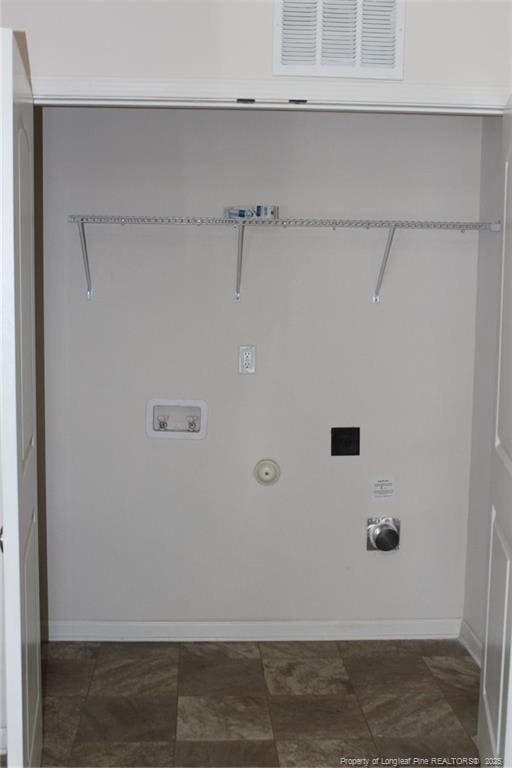 washroom with electric dryer hookup, visible vents, hookup for a gas dryer, baseboards, and hookup for a washing machine