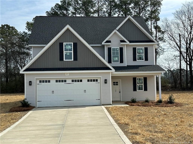 craftsman inspired home with a garage, roof with shingles, and concrete driveway