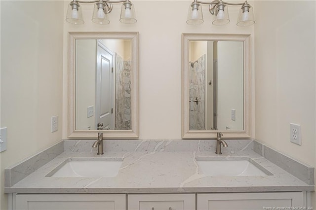bathroom with double vanity and a sink