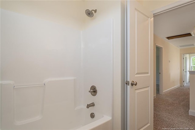full bathroom with baseboards and  shower combination