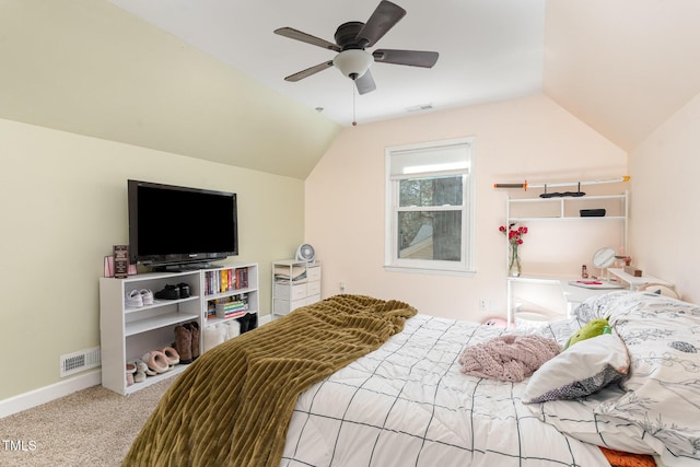 bedroom featuring visible vents, carpet, and vaulted ceiling