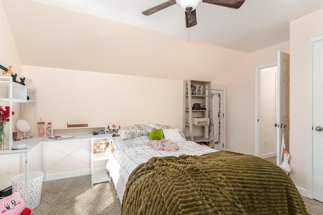 carpeted bedroom with lofted ceiling and a ceiling fan