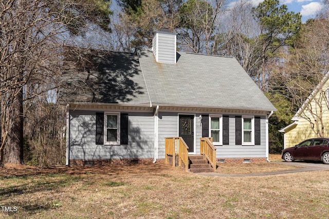 cape cod-style house with a front yard, a chimney, and crawl space