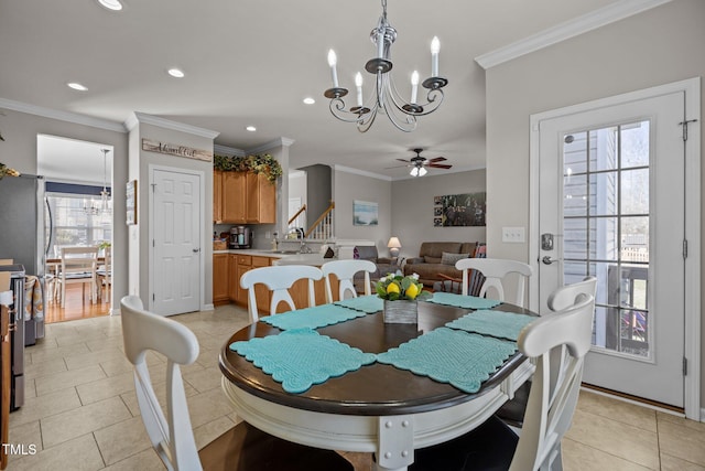 dining room with light tile patterned floors, recessed lighting, ceiling fan with notable chandelier, and crown molding