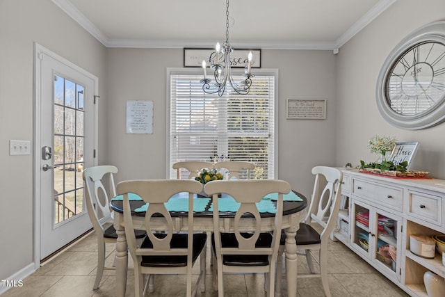 dining room featuring a chandelier, light tile patterned floors, baseboards, and ornamental molding