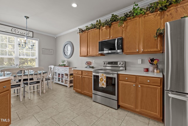 kitchen with a notable chandelier, stainless steel appliances, crown molding, and light countertops