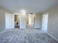 interior space featuring baseboards