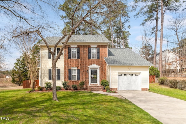 colonial home featuring fence, concrete driveway, a front yard, roof with shingles, and an attached garage