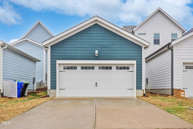 view of front of house with a garage and driveway
