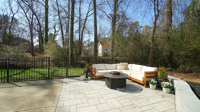 view of patio featuring outdoor lounge area and fence