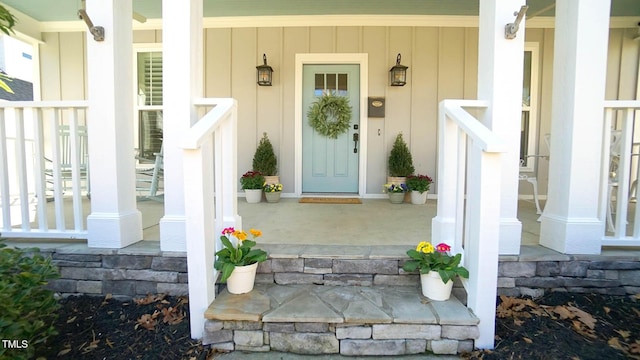 doorway to property with a porch