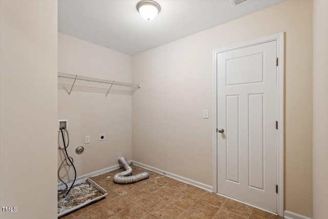 clothes washing area featuring laundry area, hookup for an electric dryer, baseboards, and washer hookup