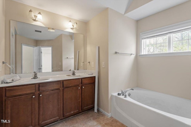 full bathroom featuring visible vents, double vanity, a sink, tile patterned flooring, and a bath